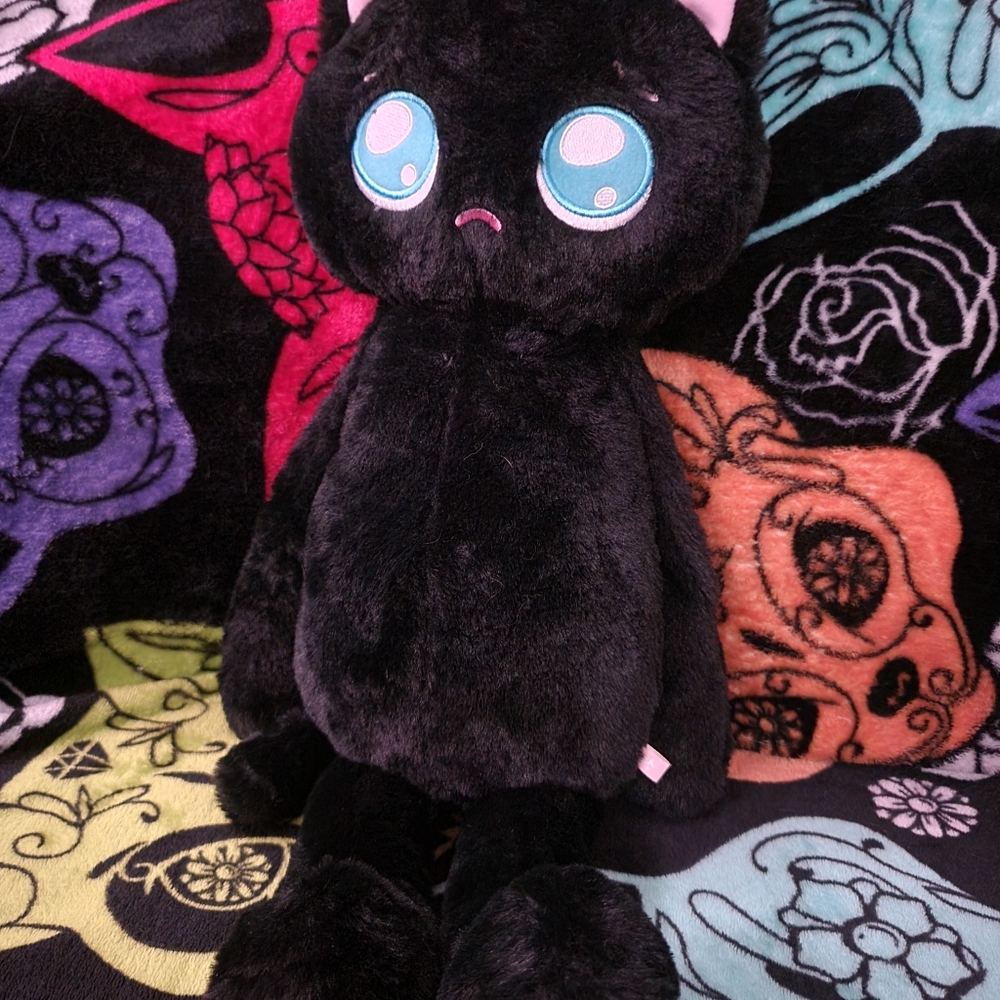 Sad black cat weighted plush